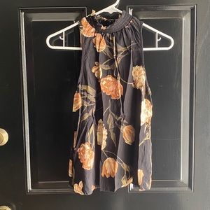 Floral high neck sleeveless blouse